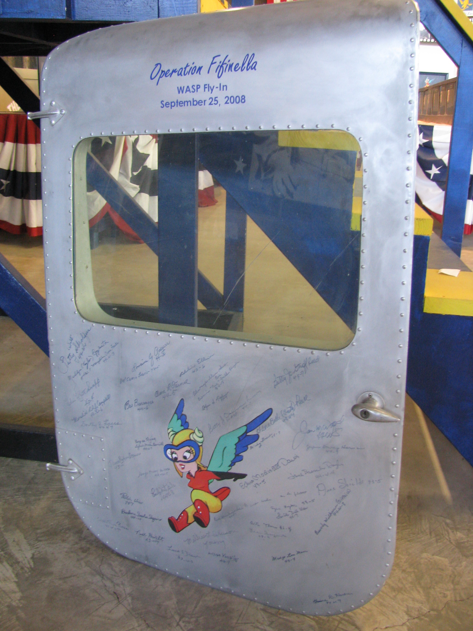 airplane door with WASP ladies signatures